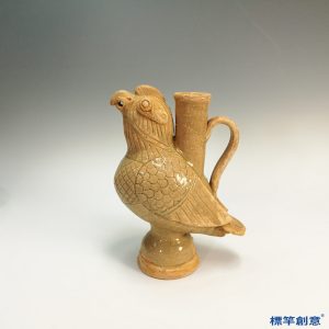 EG018 南北朝洪州窯黃釉佛教鸚鵡形供水器